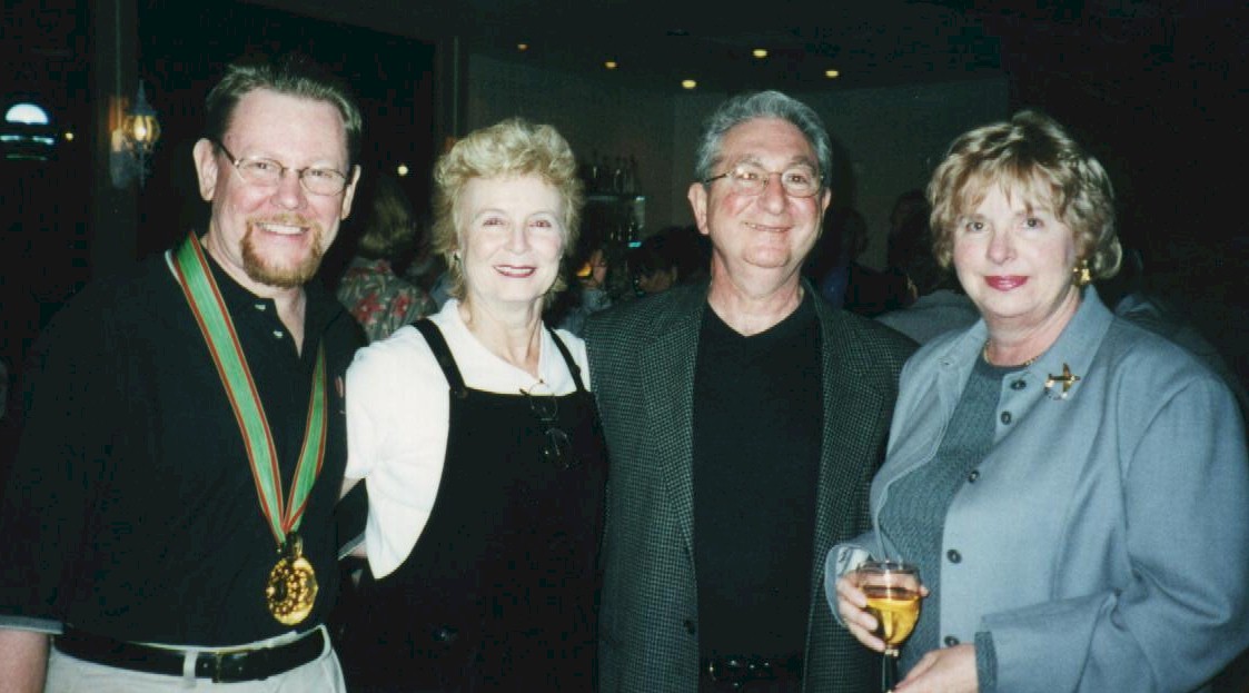 Larry and MaryJo Rinaldi (center) are joined by Don Hill (left) and Mrs. Murat Day (right)