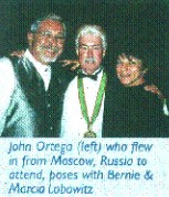 John Ortego (left) who flew in from Moscow, Russia to attend, poses with Bernie and Marcia Lobowitz